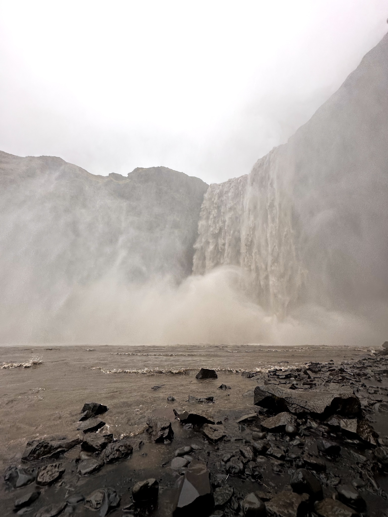Skogafoss (waterfall) up close showing how powerful a waterfall can be with a huge amount of water being thrown up into the air